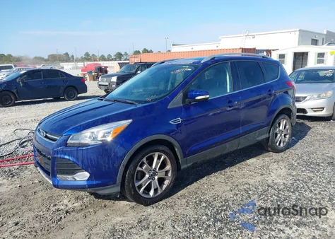 2016 Ford Escape Titanium z USA, uszkodzony, nr VIN 1FMCU0JX4GUB48809